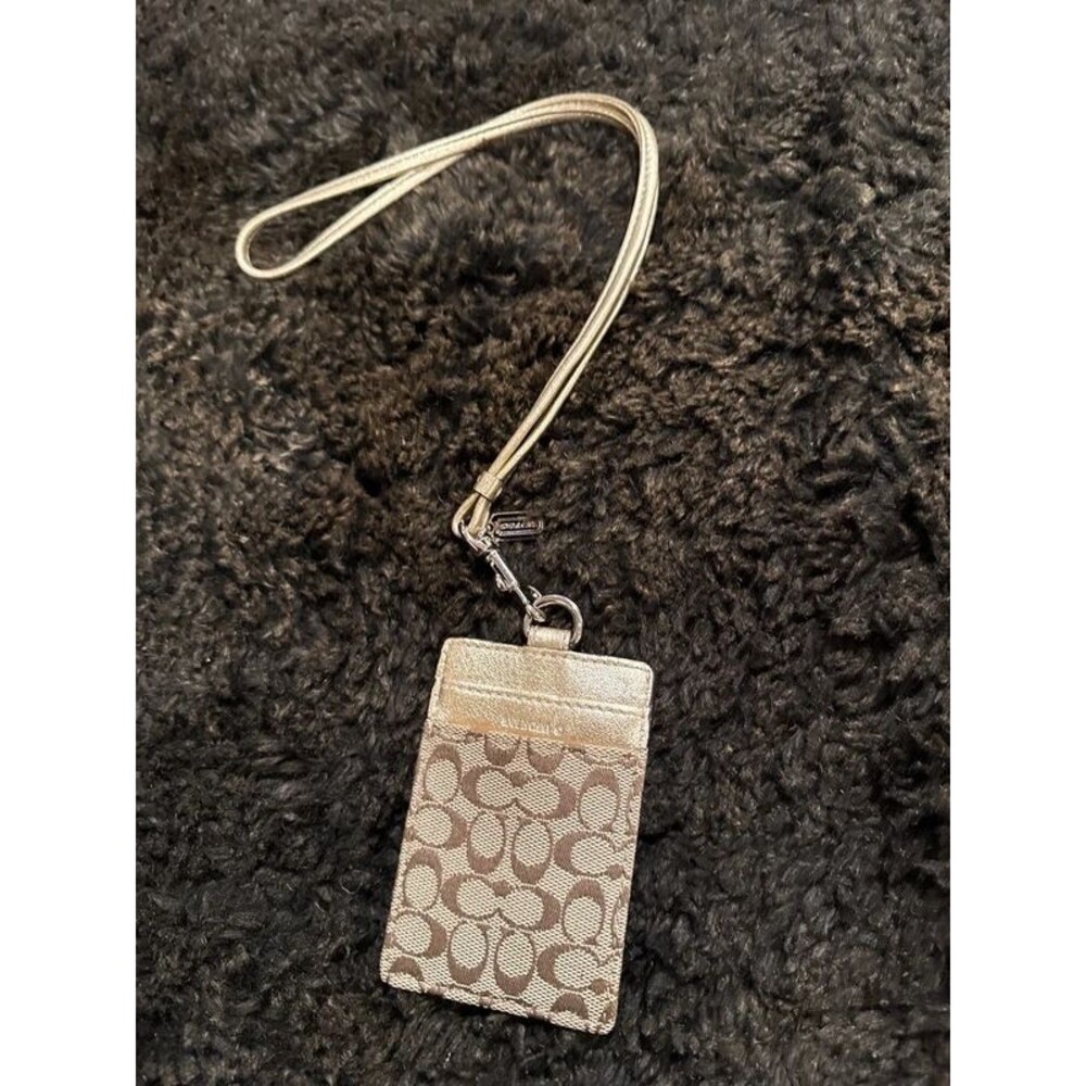 COACH Signature ID badge holder Gold